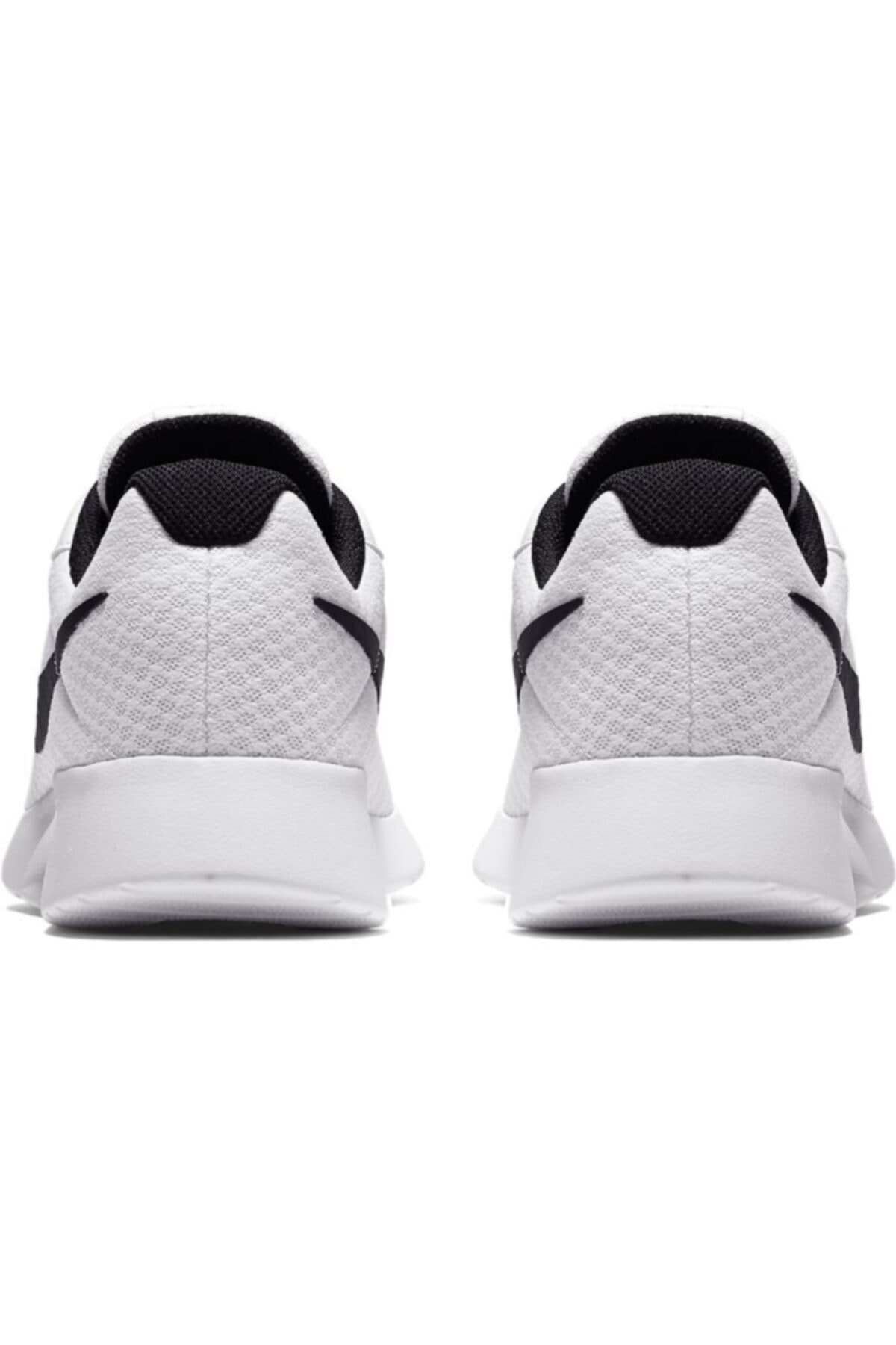 Nike tanjun white with black swoosh hotsell